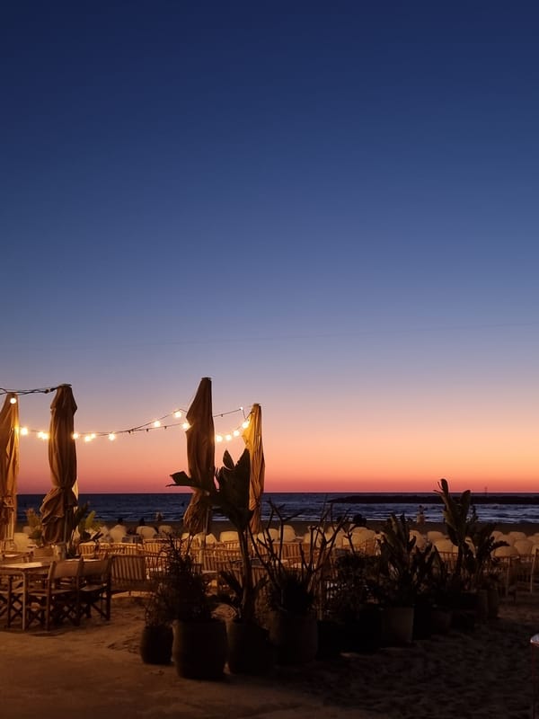 Sunset dining scene captured at Tel Aviv restaurant