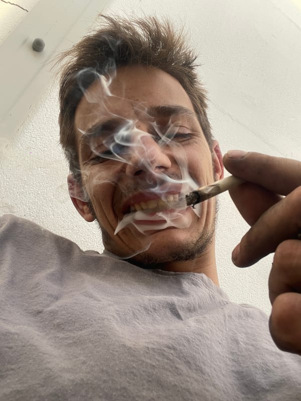 Close-up angles on smoking indoors, textured wall backdrop.