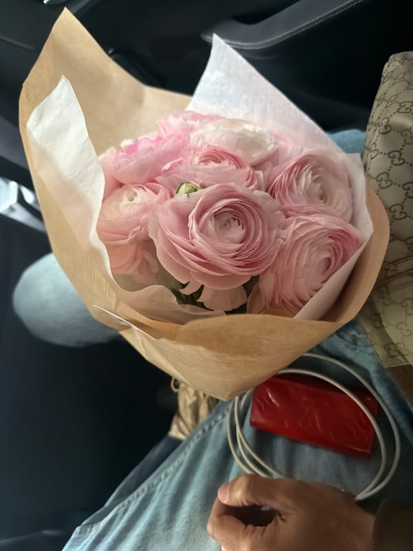Pink flower bouquet spotted in Paris car