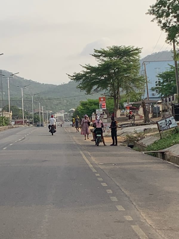 Morning street life documented in Adankolo, Nigeria