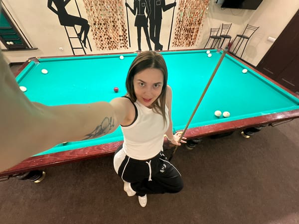 Evening billiards session documented at Perm pool hall