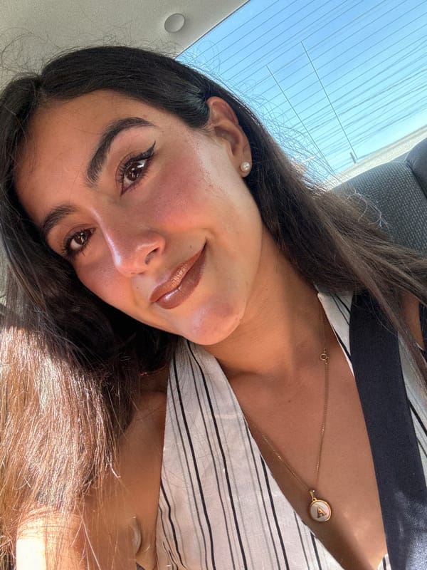 Woman takes selfies in car in Puebla, Mexico