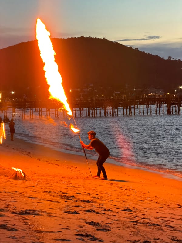 Fire performers and beach scenes at dusk, Ko Samui