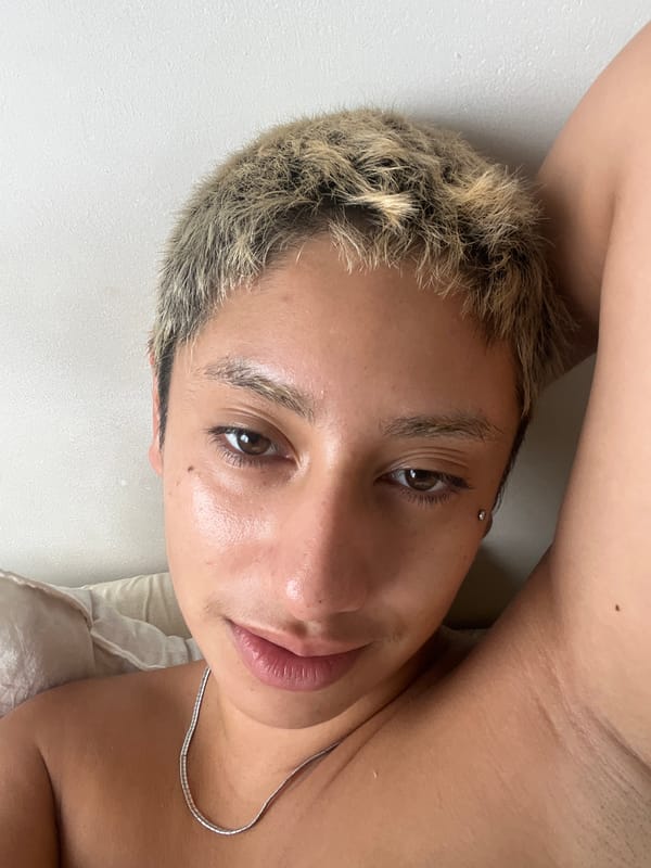 Person photographed reclining on blanket in Buenos Aires