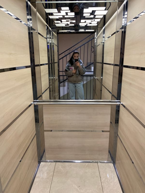 Ordinary moments captured in Novi Sad: elevator interior, sidewalk scene