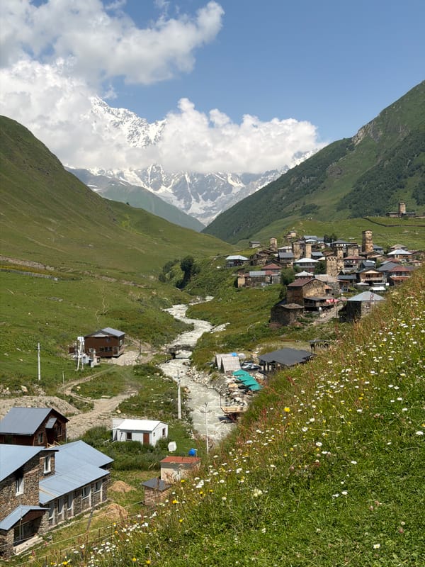 Ushguli's medieval stone towers in the high Caucasus, summer morning