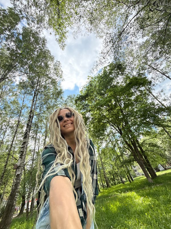 Woman enjoys afternoon outing with child in Rusanovo, Russia