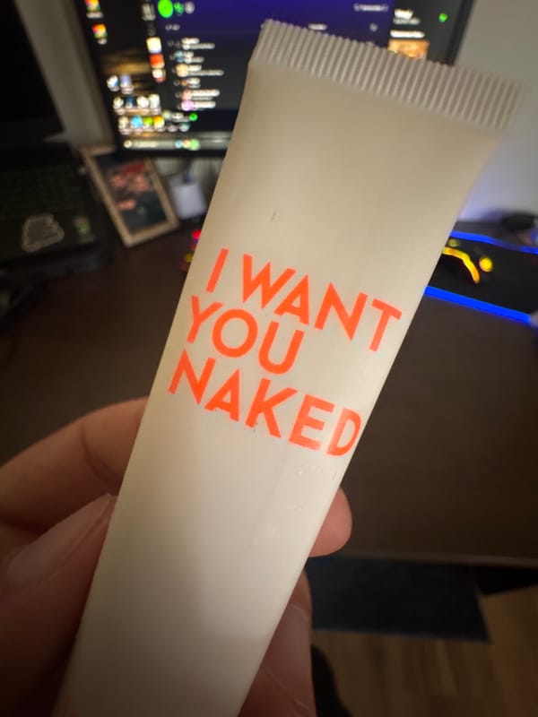 Person holds provocative white tube product in Varna, Bulgaria