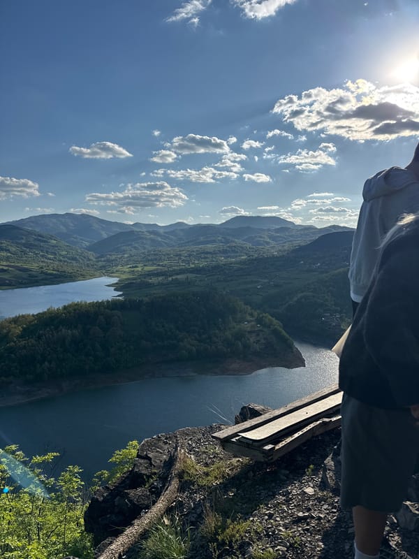Visitors enjoy scenic mountain overlook at Lake Zaovine, Serbia