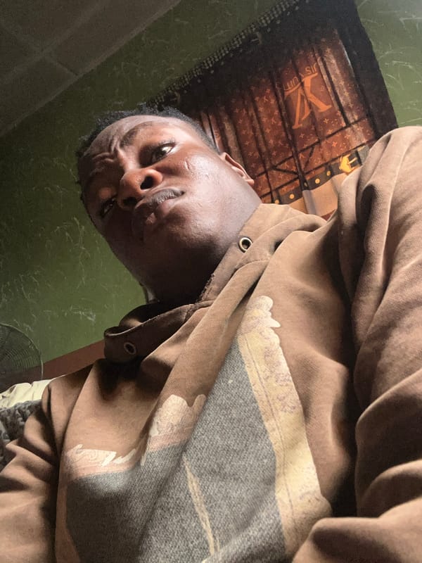 Person documents morning selfie session in Ikorodu bedroom