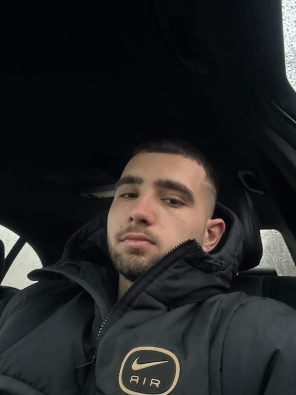 Man takes early morning car selfie in Bulgarian village