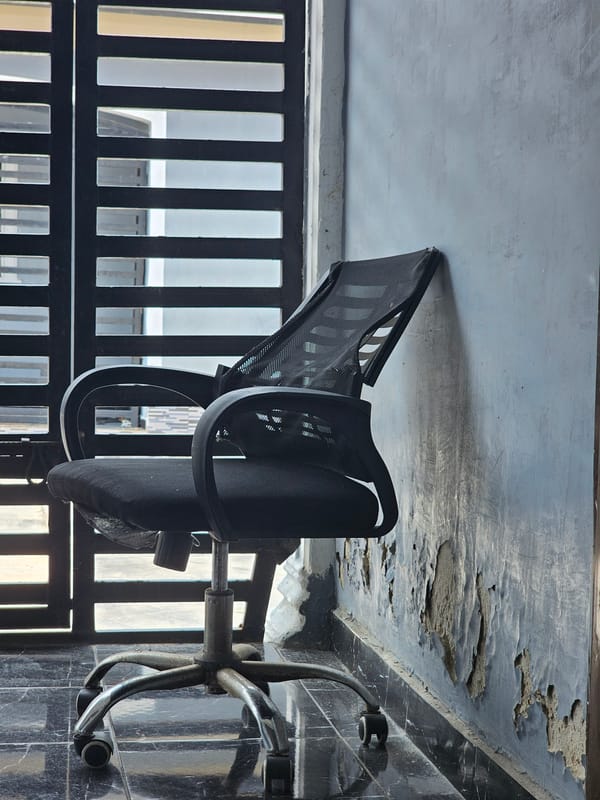 Office chair and upside-down anime footage captured indoors