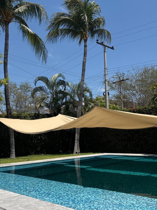 Poolside relaxation scene captured in Puerto Escondido, Mexico