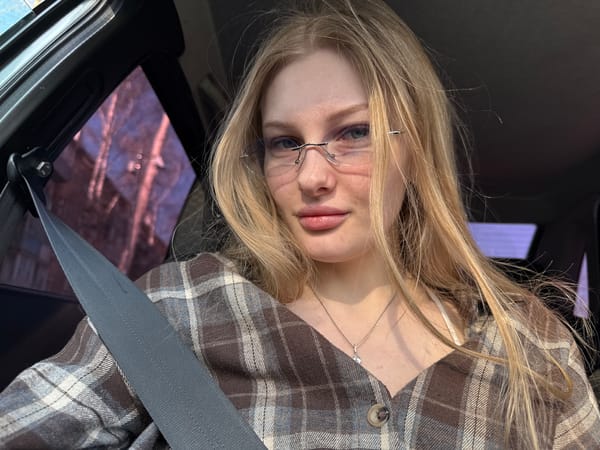 Woman takes selfies in car in Perm, Russia