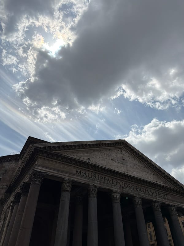 Tourist documents mix of ancient and modern Rome scenes