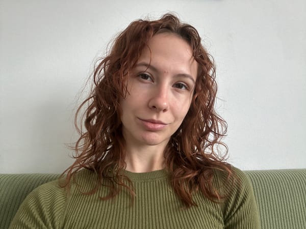 Quiet indoor moments with plants and cat captured in Novi Sad