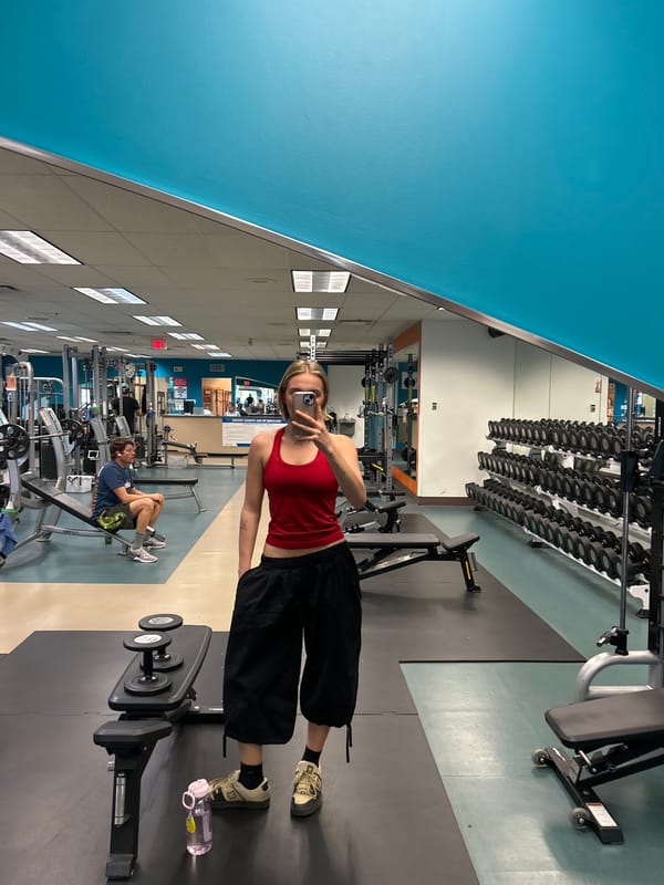 Woman takes mirror selfie at Whistler gym