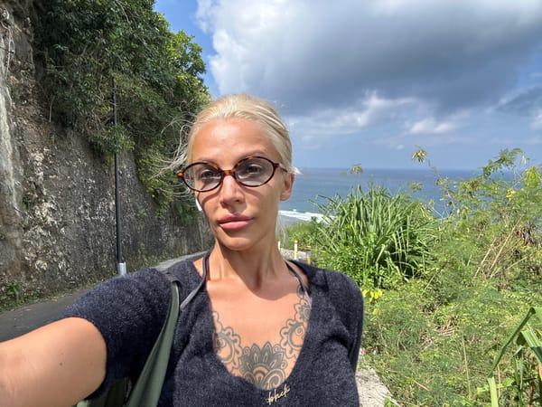 Melasti Beach, Bali — cliffside road, reef, and coastline