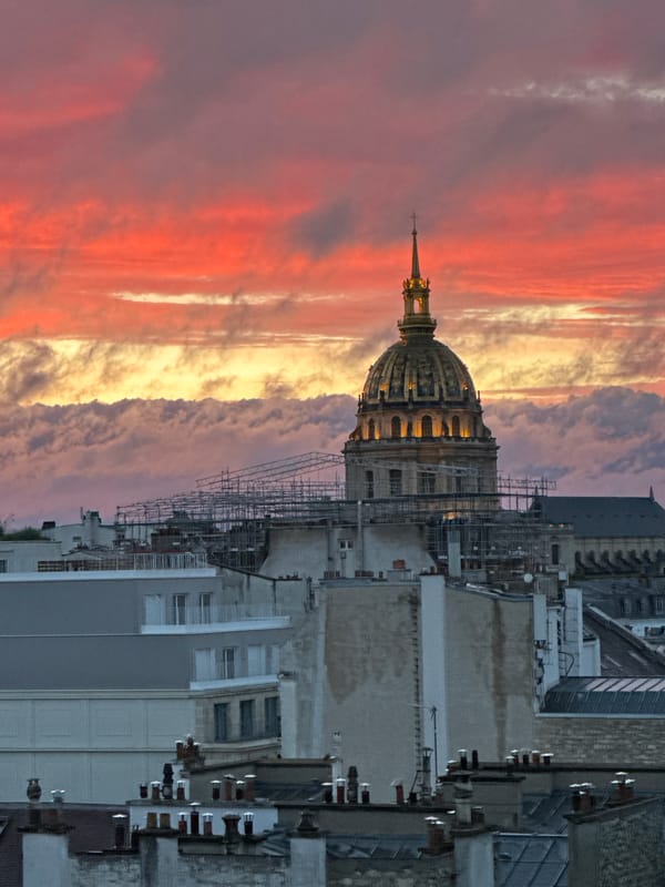 Dramatic sunset illuminates Paris skyline, Eiffel Tower captures attention