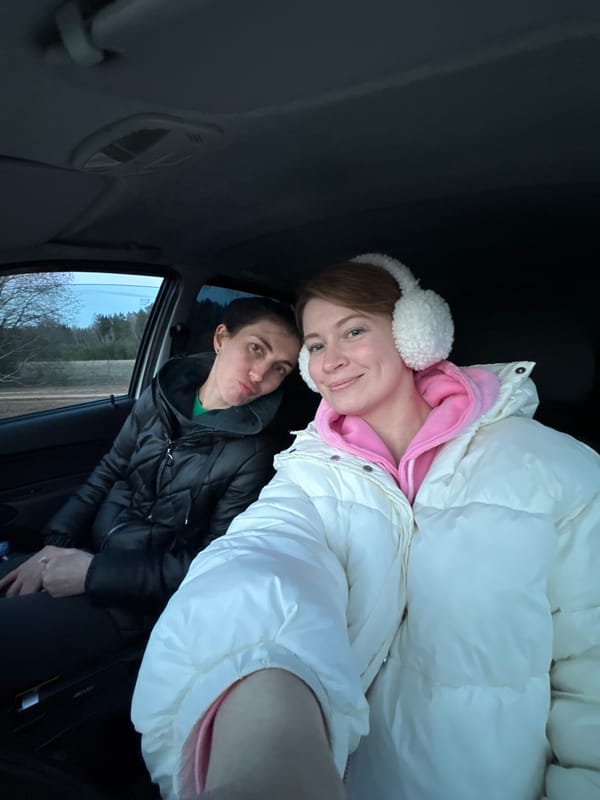 Car occupants photographed during drive in Вассята, Russia