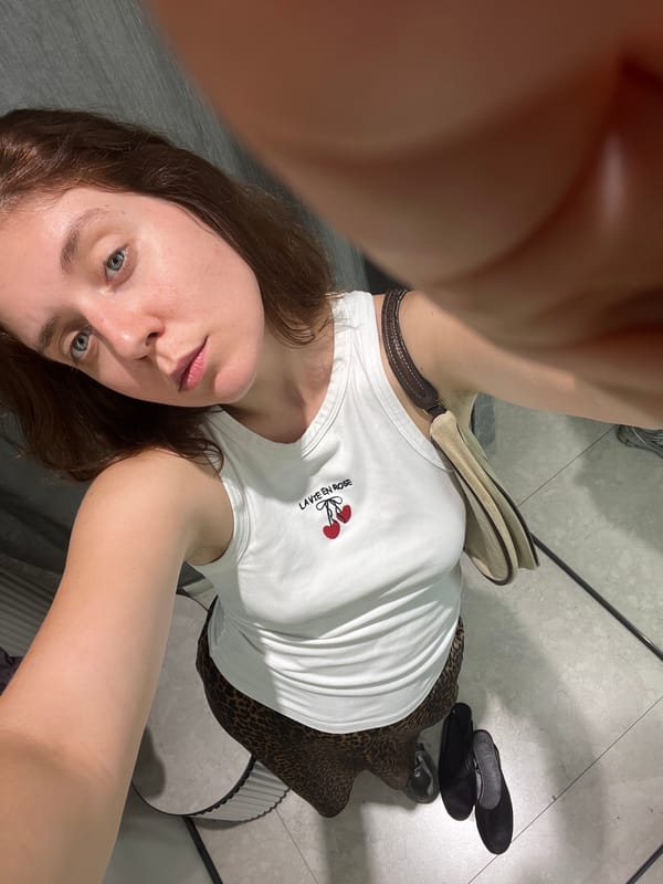 Dressing room selfies, two angles, one outfit.