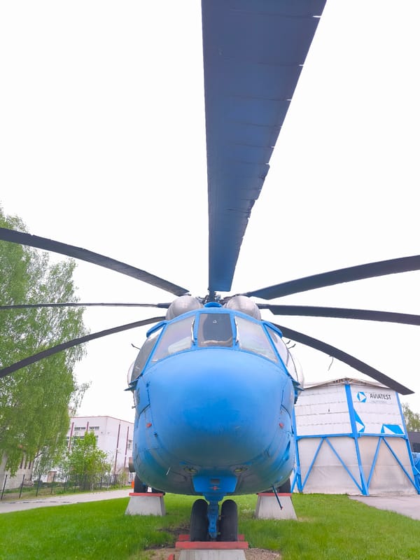 Blue transport helicopter spotted parked in Riga with AVIATEST markings
