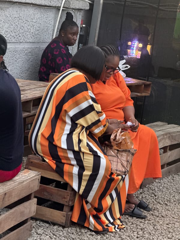 Women gather at outdoor food venue in Gwarinpa