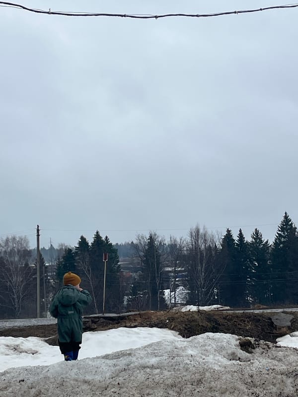 Person in yellow hat spotted on snowy platform in Pavlovka