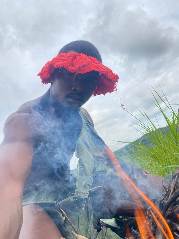 Selfies and landscape shots at a red ravine in Achara, Nigeria