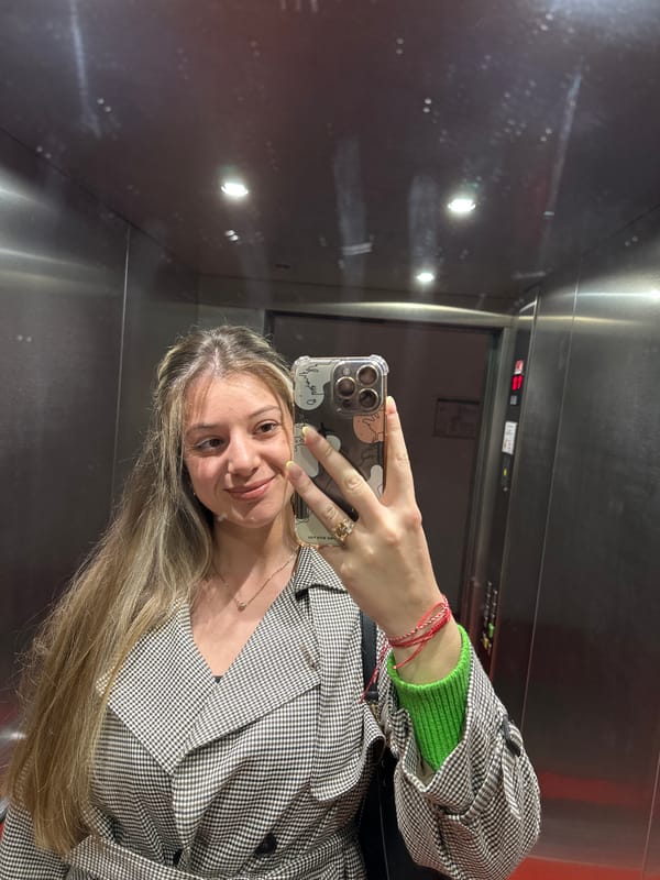 Woman takes selfie in elevator in Essen, Germany