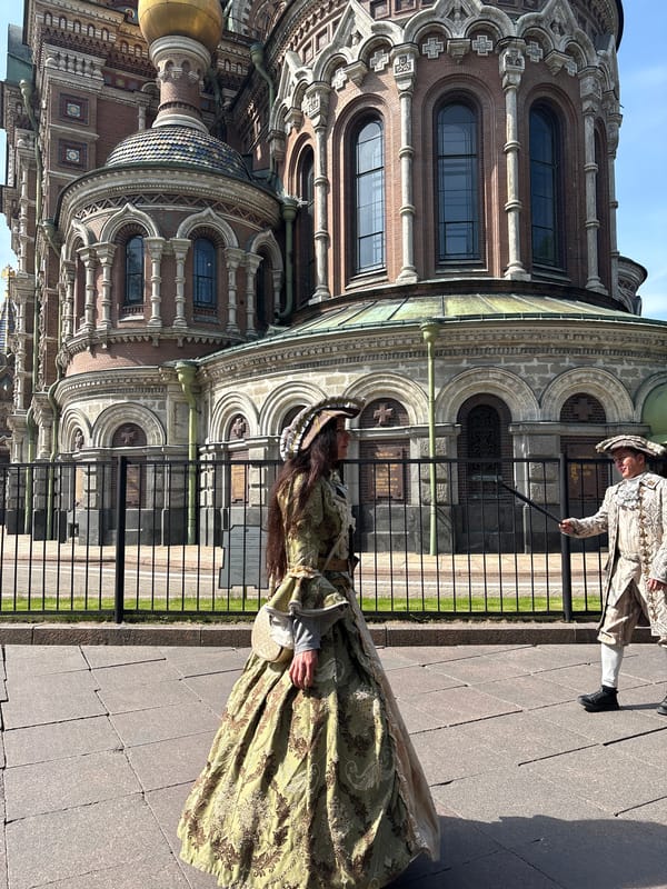Street musicians, costumed performers enliven Saint Petersburg church square