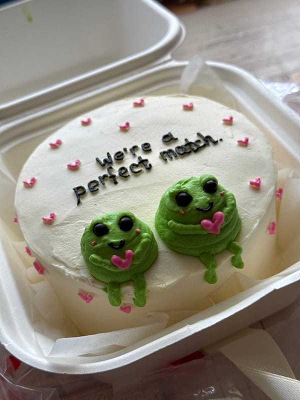 Frog-topped 'perfect match' cake photographed from every angle