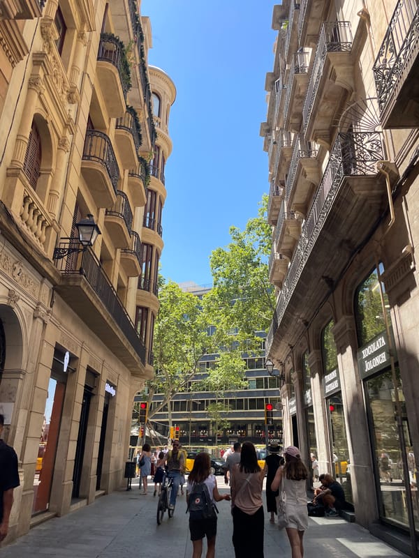 Street-level Barcelona: balconies, Las Ramblas, and midday sun