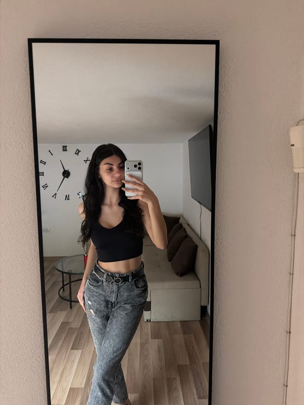 Woman takes mirror selfies in Gabrovo, Bulgaria