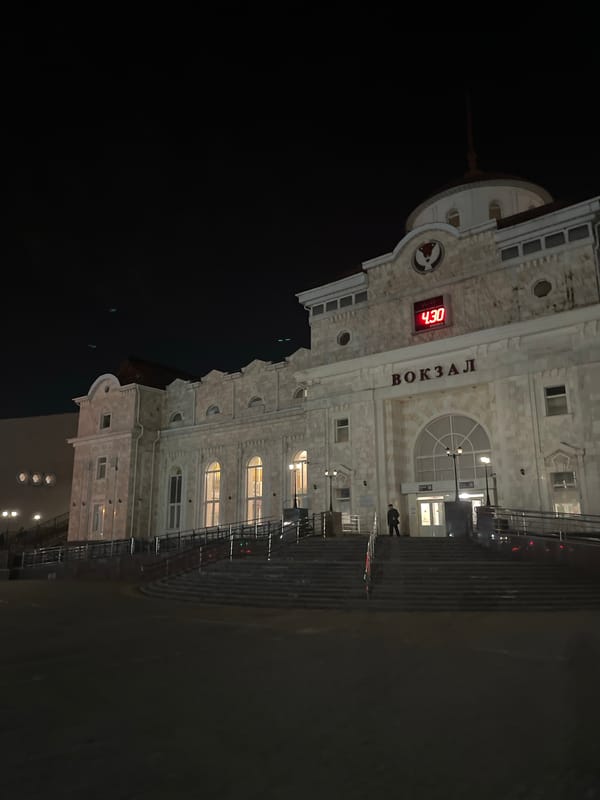 Izhevsk railway station photographed at night with illuminated facade
