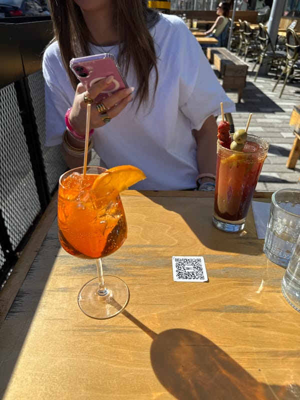 Cocktails and sunny evening captured at Montreal outdoor venue