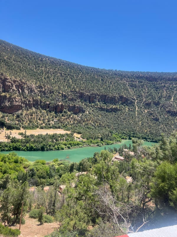 Green river winds through dramatic gorge near Bin El Ouidane