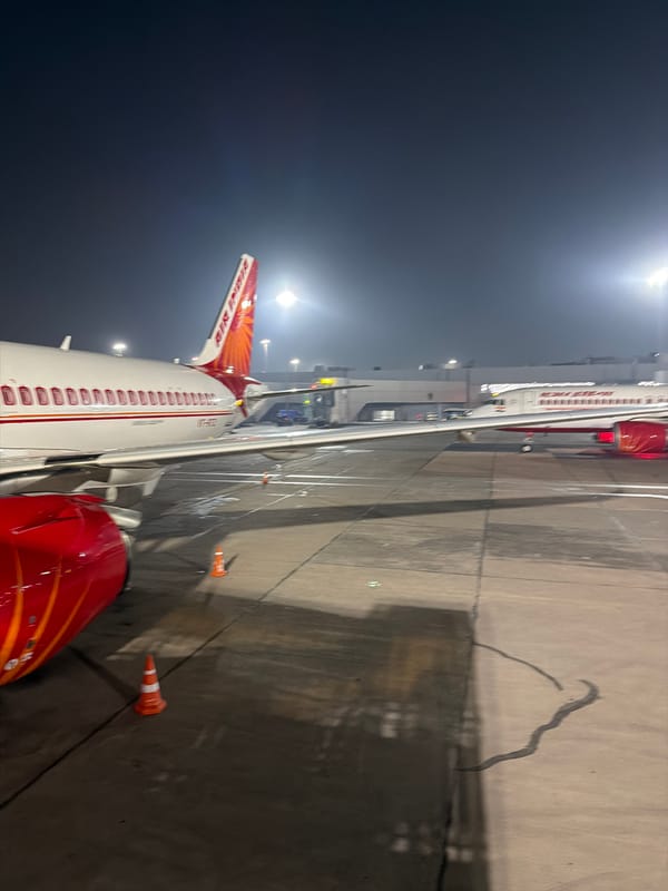 Air India and IndiGo aircraft on the tarmac at Delhi's IGI Airport