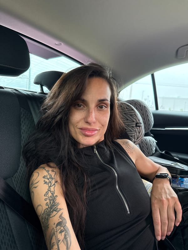 Woman photographed smiling in car backseat in Pleven