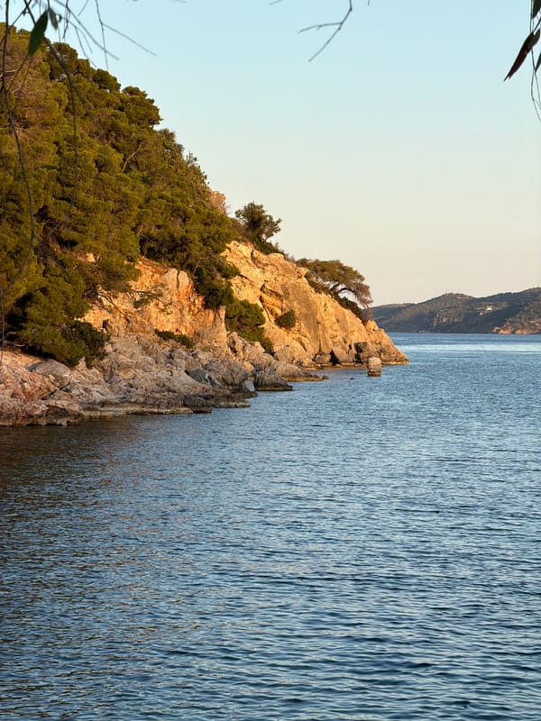 Peaceful coastal scenes documented across Poros, Greece during evening hours