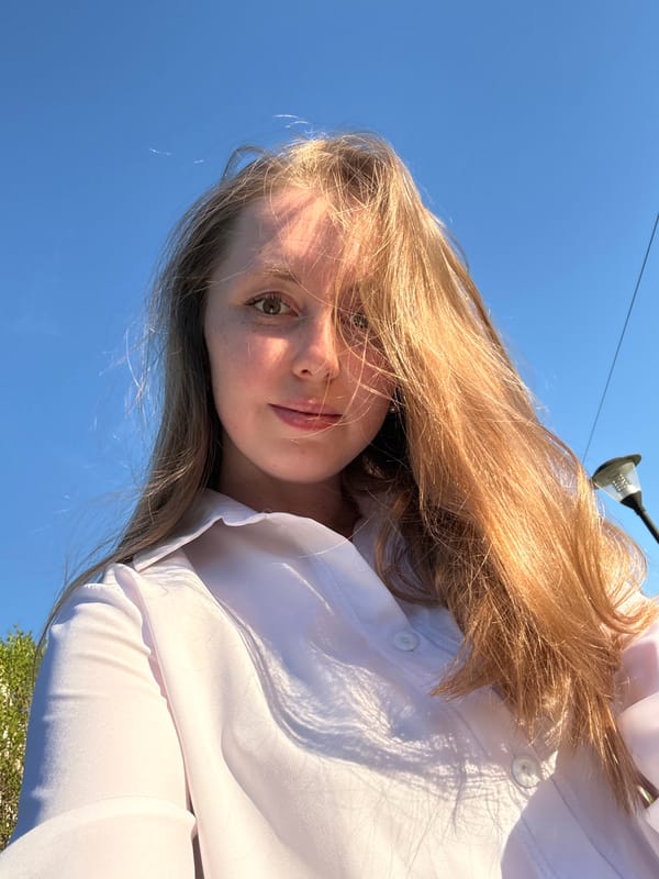 Personal photos document afternoon moments with woman and cat