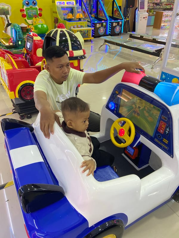 Family arcade visit in Kecamatan Pati, rides and claw machines