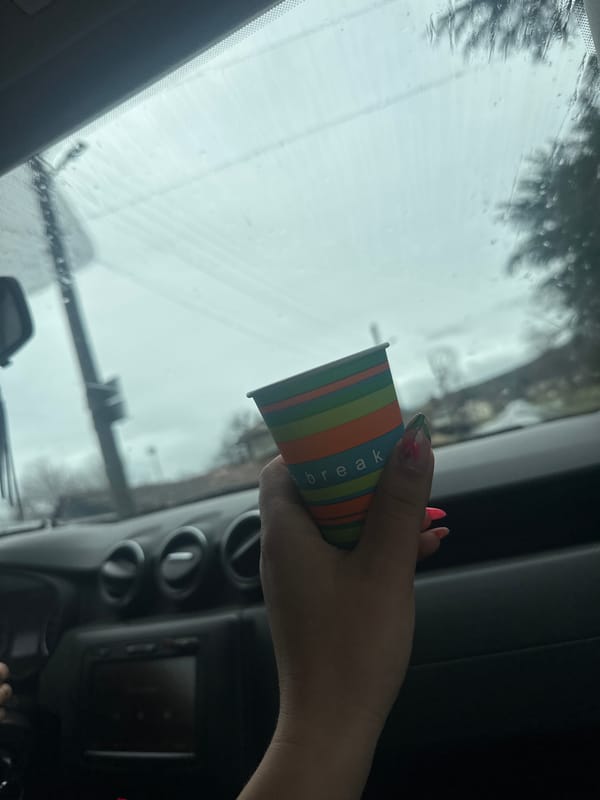Tea break in car during rainy weather in Bulgaria