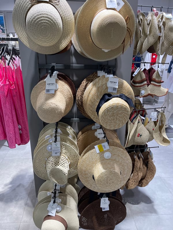 Shoppers browse summer clothing at Moscow retail stores