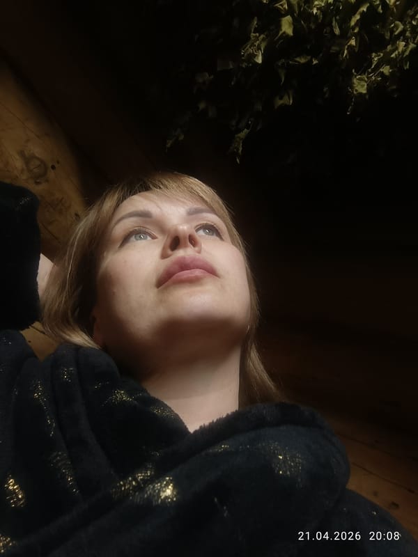 Woman observed in wooden interior space in Chaikovsky, Russia