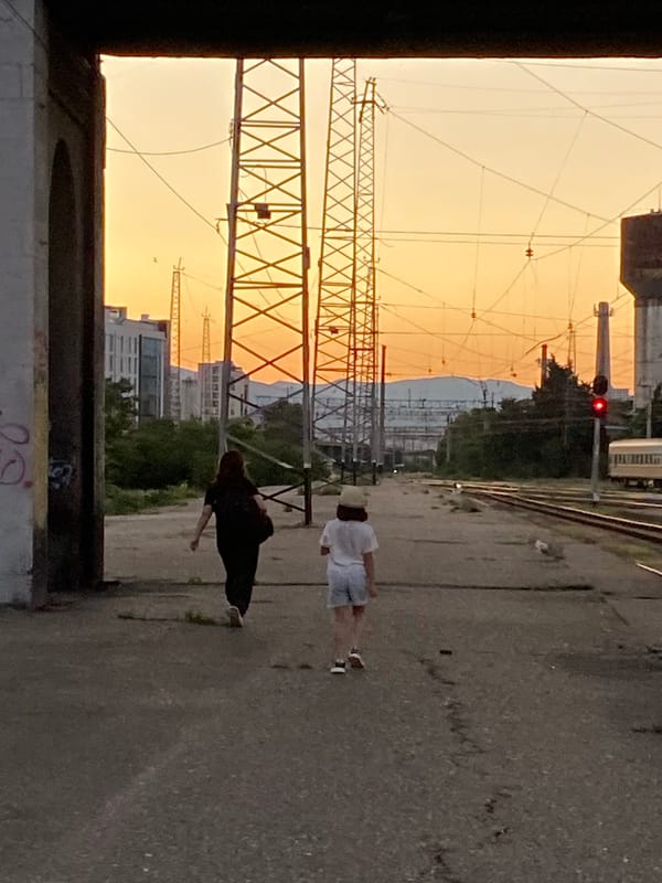 Tbilisi train station at golden hour, platform life and infrastructure