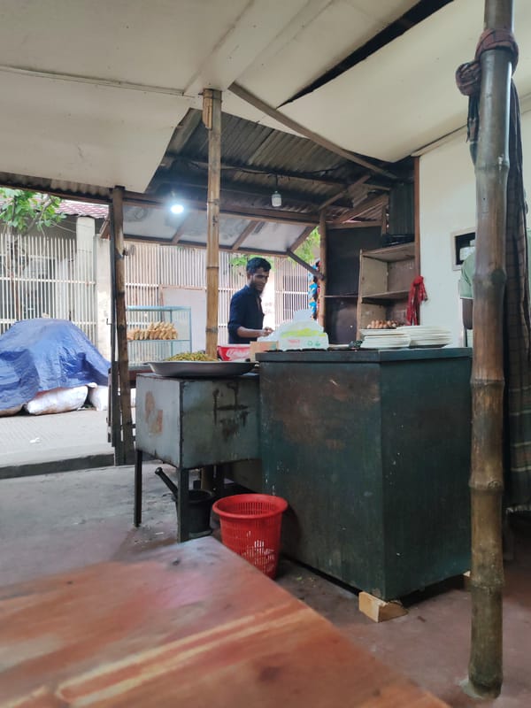 Late night street food service captured in Dhaka