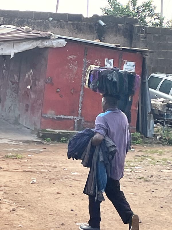 Street life, infrastructure, and greenery in Rafin Par, Nigeria