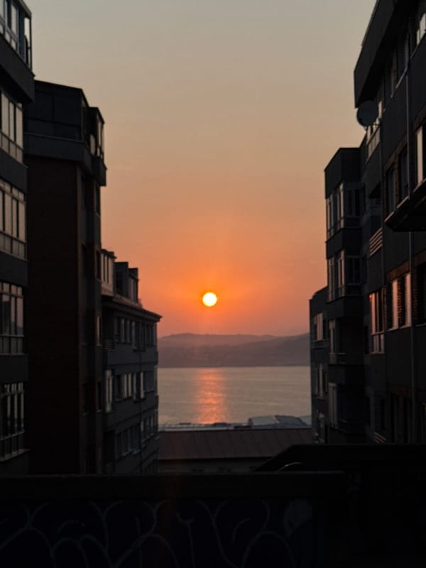 Sunset over Ría de Vigo, plus an elevator selfie