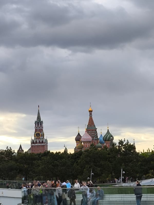 Moscow landmarks documented during overcast afternoon with patriotic displays